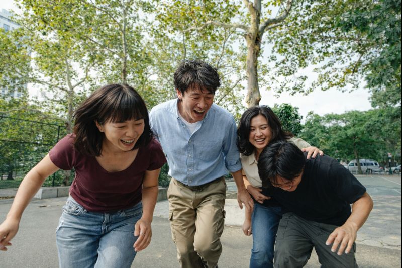 Group of young people gathered in a park